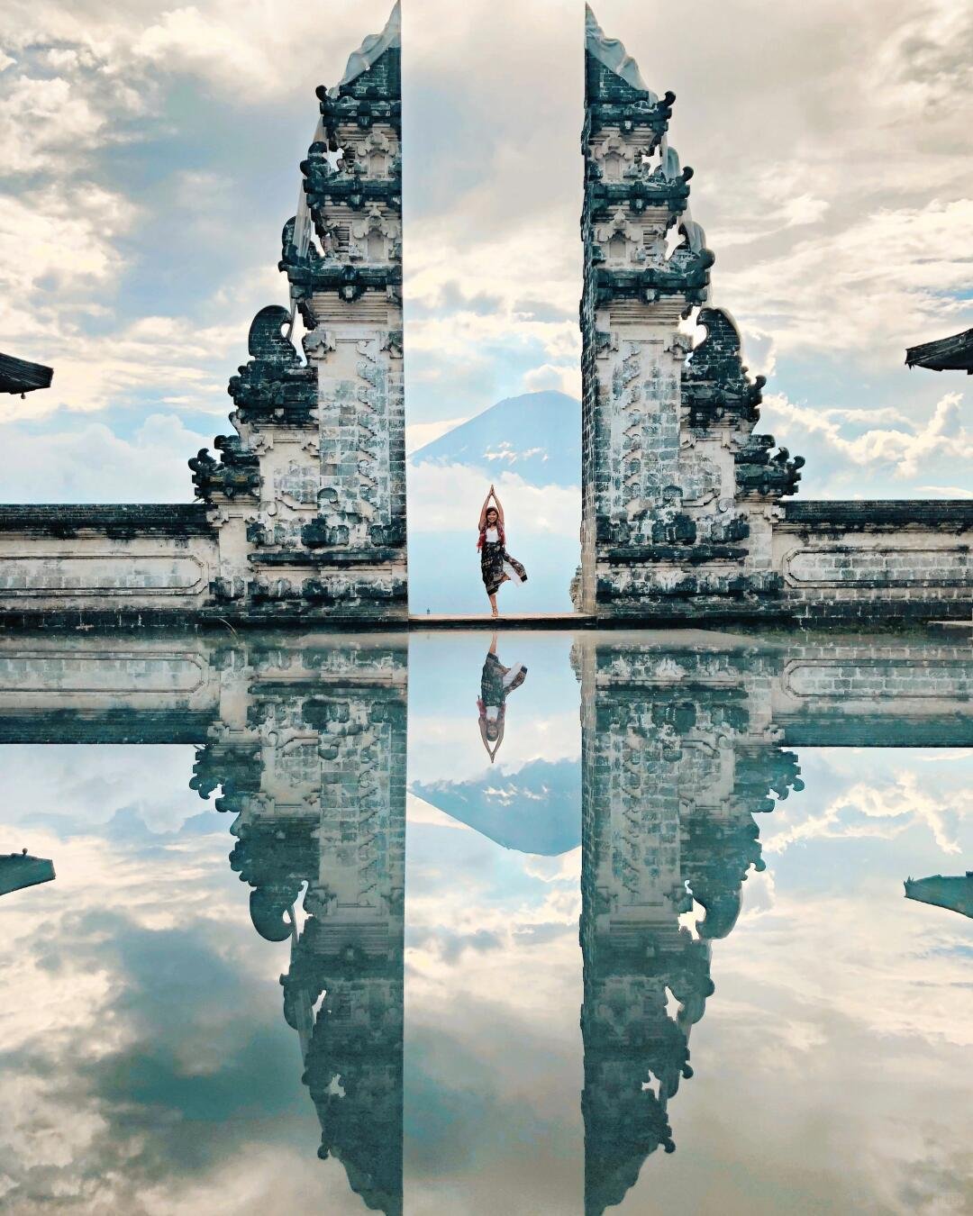 Gates of Heaven at Lempuyang Temple reflected in water